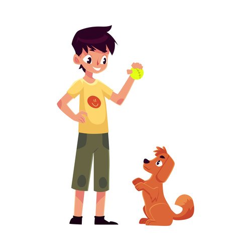 Teenage boy standing and playing with his fluffy red dog, puppy,